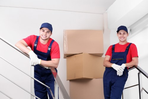 Organised office relocation with labelled boxes and furniture