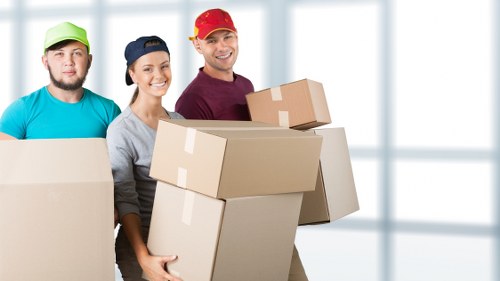 Packed boxes and furniture ready for a house move in Kennington