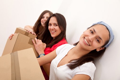 Packed office boxes and labelled items ready for transport