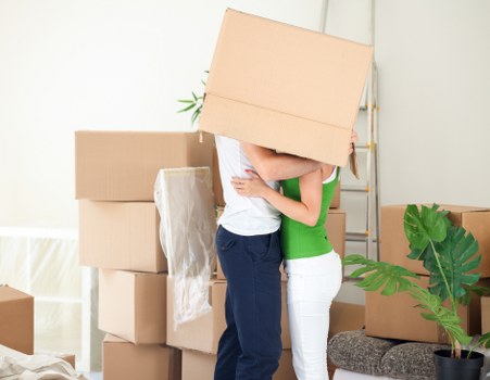 Professional movers handling household items during a Kennington relocation
