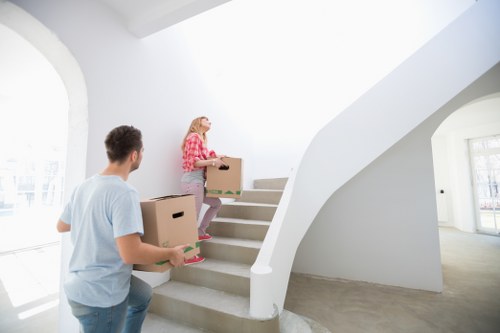 Local moving van outside a Kennington home with stair access