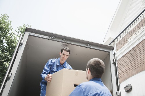 Loading furniture into a van for a Kennington house move