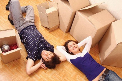 Packed boxes and furniture ready for a move in Kennington flat